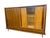 This elegant mid-century bar cabinet from the late 1950s to early 1960s impresses with its high-quality craftsmanship,...