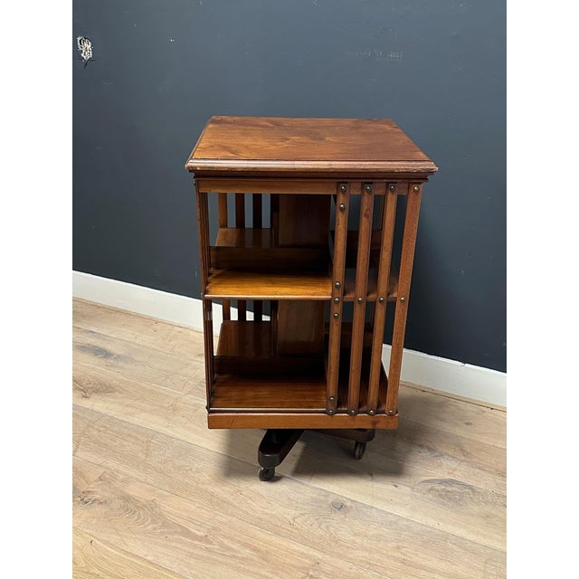 Beautiful antique walnut book carousel of exceptionally fine quality by the renowned English 19th-century furniture maker...