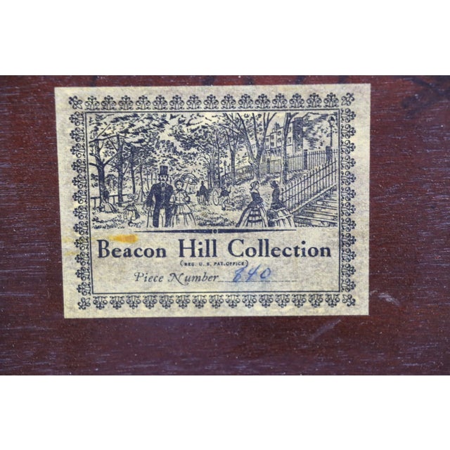 Beacon Hill Mahogany flamed double headboard.