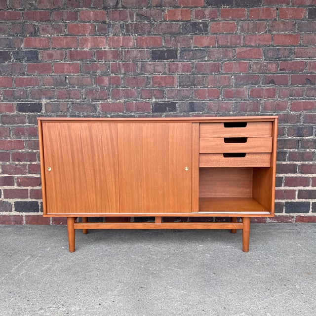 A handsome and unusually tall mid-century modern credenza designed by Milo Baughman for Drexel, from the Today’s Living...