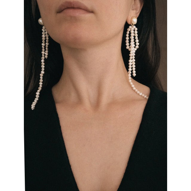 The Belle Earrings make a perfect statement for all occasions and are super lightweight. Handmade with: Freshwater Pearls,...