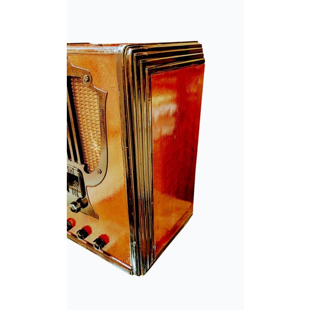This is a beautiful vintage Philco Model 665 tube radio, a tombstone-style radio dating from 1935. It features a...