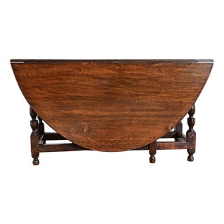 Early 19th Century French Oak Gate Leg Drop-leaf Dining Table For Sale