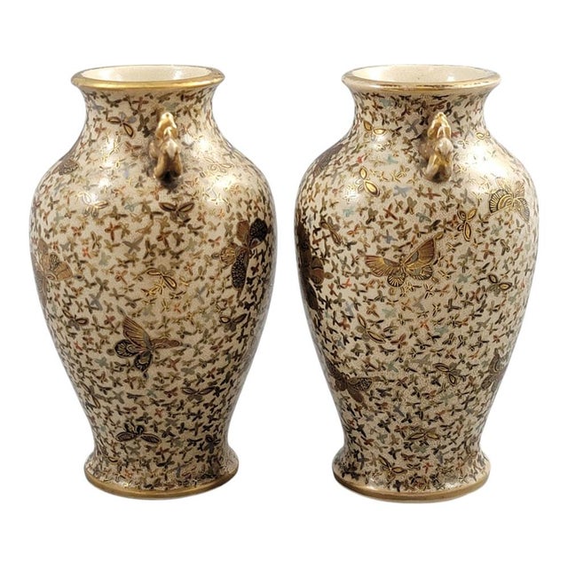 A fine and visually striking pair of Japanese Satsuma vases, signed Kinzan and dating from the late Meiji period. The pair...