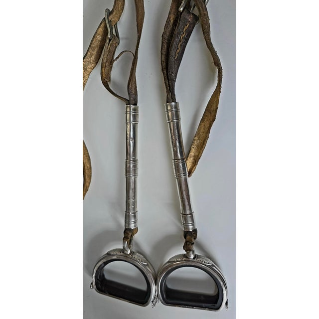 The L.Begulin 800 Silver Horse Stirrups with Leather Straps are a high-quality pair of equestrian accessories designed by...