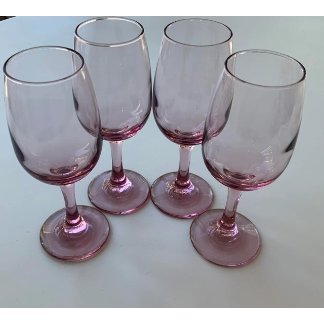 A set of 4 plum/lavender Libbey stemmed glasses. Pictures do not do the color justice.