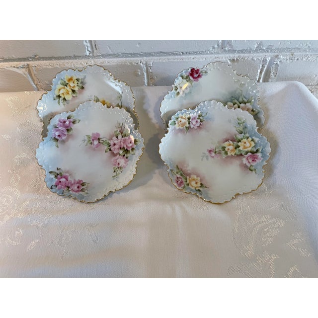 I have four lovely antique Rosenthal Continential, Monbijou, Bavarian, Germany, hand painted decorative plates. These...