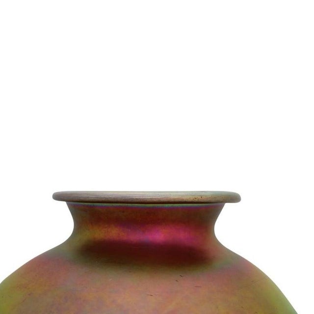 This oversized antique Steuben Gold Aurene art glass vase, dating to approximately 1920, exemplifies the exquisite...