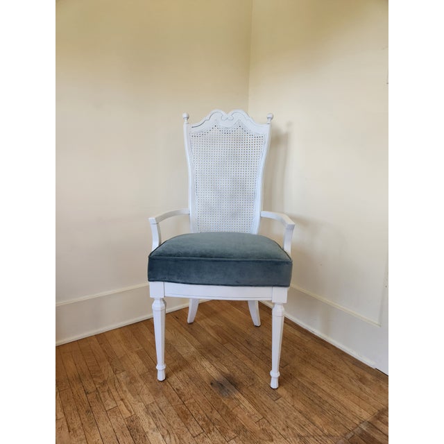 This chair was originally made in the 1970's. It was recently repainted and the seat was reupholstered. There are some...