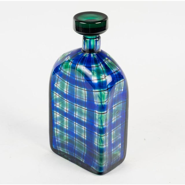 Scozzese, also known as Scottish, also known as Tartan Blown glass ogival bottle, signed "Christian DIOR" on the tip....