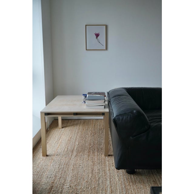 A very modestly designed constructivist table whose size measures somewhere between a dining table and a coffee table. It...