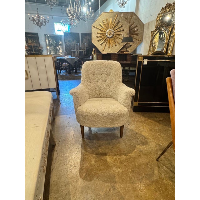 The Danish MCM Armchair with Shearling fabric is a stylish and comfortable seating option. This armchair exudes a modern...