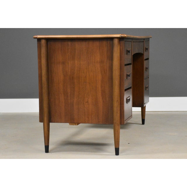 A mid century modern walnut and ash desk with a double bank and finished back made by Lane Acclaim. Made in USA. Circa...