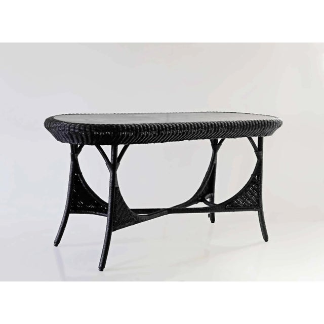 Vintage, black painted wicker console table with original plank boards on the top. Painted surface is more recent....
