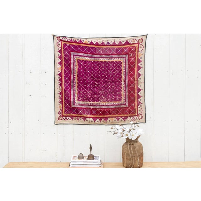 This finely embroidered antique textile panel is a testament to the artistry of the Kutch region in Gujarat, India, hails...