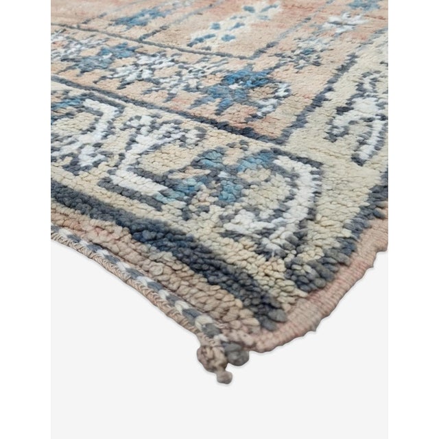 Vintage Moroccan Rug | Handwoven Wool Rug with Coral Field and Ornate Medallions This refined vintage rug features a warm...