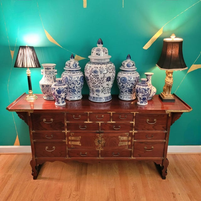 This is a gorgeous late 20th century Korean apothecary chest that has a lot of versatility. It could be a dining room...