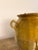 Antique golden yellow glazed terra cotta confit pots from Southwest France. These 19th century vessels once preserved...