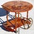This Italian marquetry inlaid tea cart is a stunning mid-century Sorrento-style bar cart inspired by the renowned...