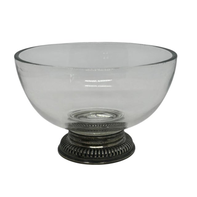 This is a vintage glass candy bowl with a sterling silver base, made by Frank M. Whiting & Co.. It features a clear, round...