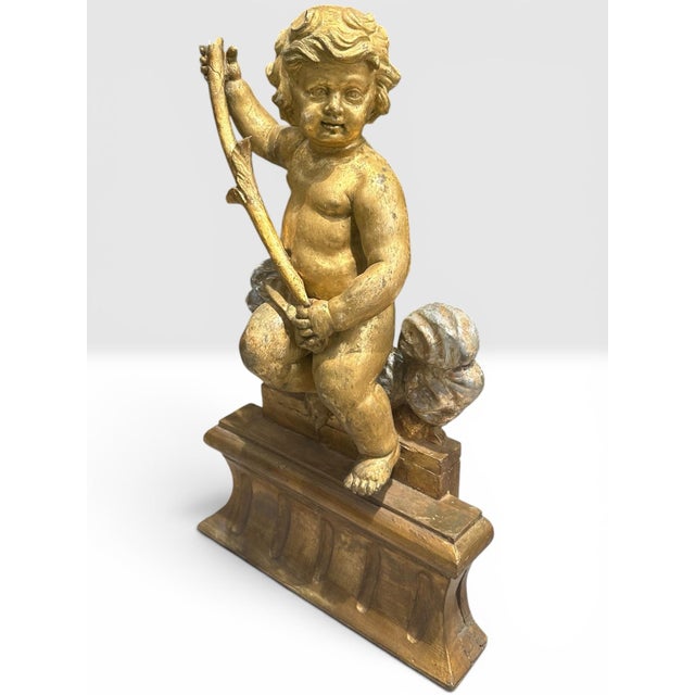 Large 18th C. Italian Baroque Carved, Gilded, Silvered Wood Putto Figure Seated. A finely sculpted, highly expressive, and...