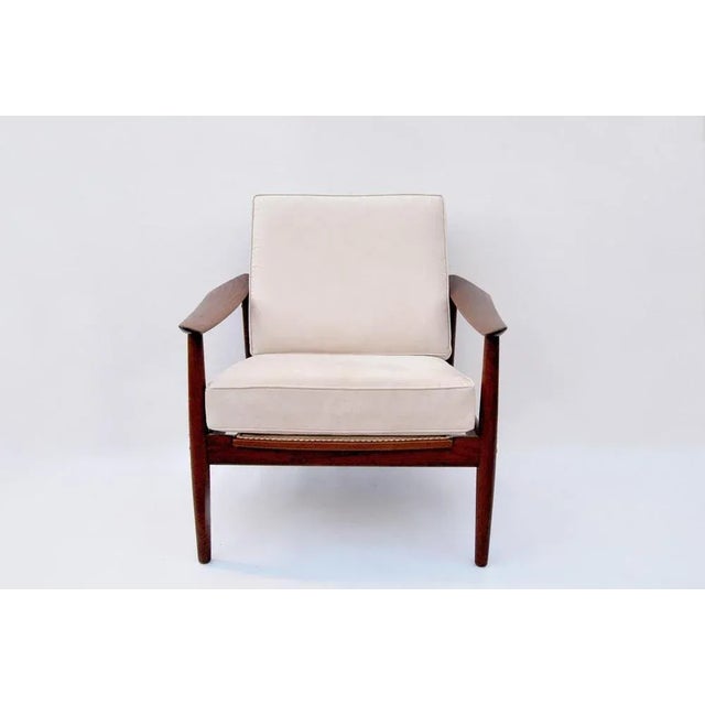 This elegant teak armchair was manufactured in Denmark in the year 1960 by France & son design Arne Vodder. Teak armchair...