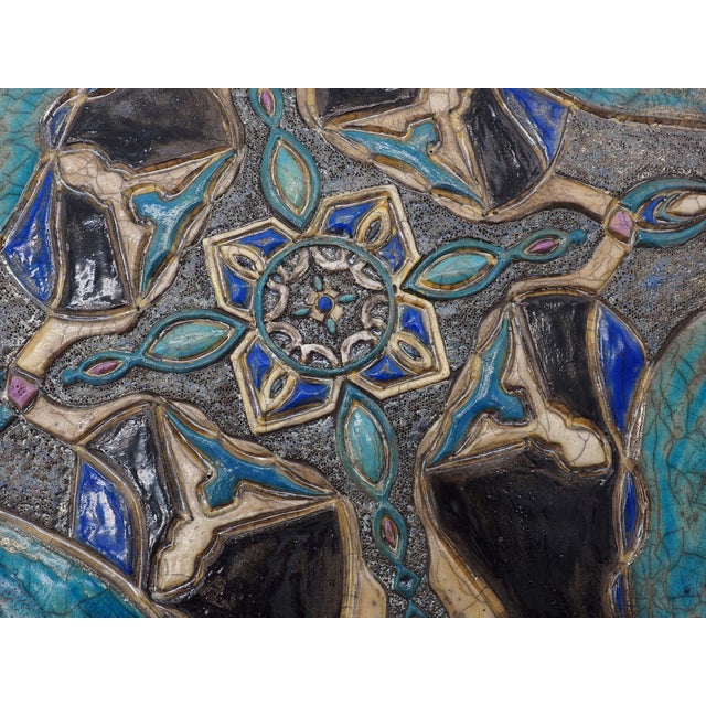 "An Essential Look" is a unique Raku ceramic work, entirely hand-molded and decorated by artist Stefania Zoppellaro. The...
