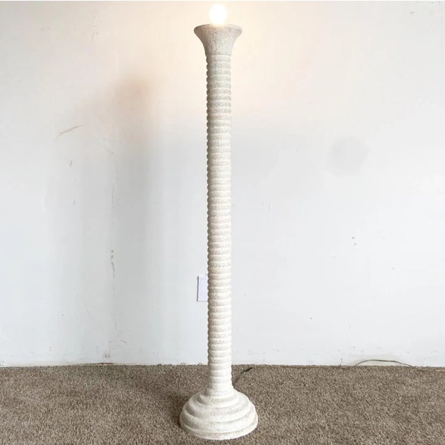 Incredible vintage postmodern ceramic floor lamp. Features a fibbed body with a pink green and purple speckled over white...