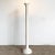 Incredible vintage postmodern ceramic floor lamp. Features a fibbed body with a pink green and purple speckled over white...