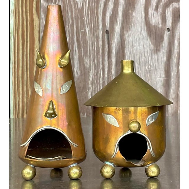 A charming collection of American-style vintage Boho tooled metal ashtrays, each featuring intricate hand-tooled designs....