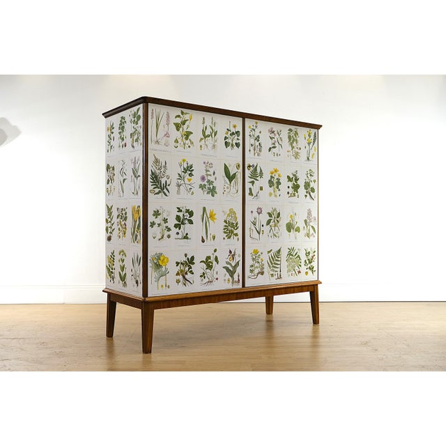 Beautiful cabinet made in the 1940´s, later covered in illustrations by C.A.M Lindman, same illustrations that Josef Frank...