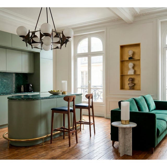 Embrace the enchantment of our brutalist-style chandelier lamp from the 1950s and uncover its enduring magnificence. with...