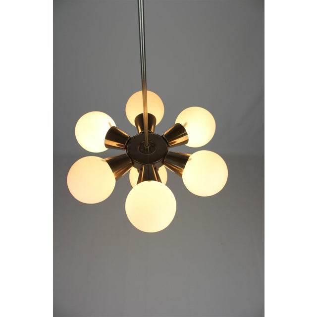 Mid-Century Sputnik chandelier. Made in former Czechoslovakia by Kamenický Šenov in the 1970s. Made of chrome plated metal...