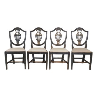 Set of Four 19th Century Swedish Blackened Wood and Gilt Lyre-Back Chairs For Sale