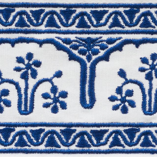 This extraordinary cotton tape features delicate embroidery that was inspired by the intricate patterning on an antique...