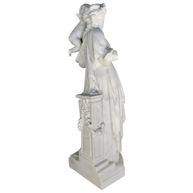 Impressive figural sculpture in white biscuit porcelain, depicting Venus with Cupid (Love) in an elegant, classically...