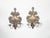 A pair of Italian Rococo style tin candle sconces from the 19th century, with three arms and feather motifs. Created in...