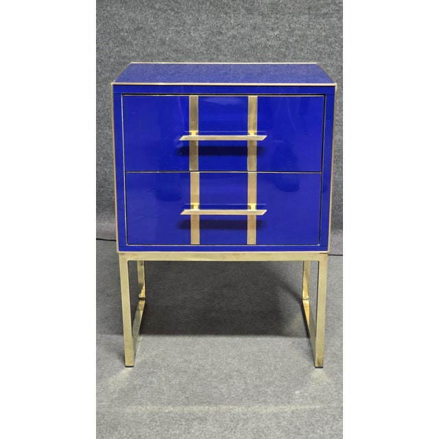 These beautiful bedside tables are handmade in Italy. They have a blue Murano glass top and drawers, hand-blown by skilled...