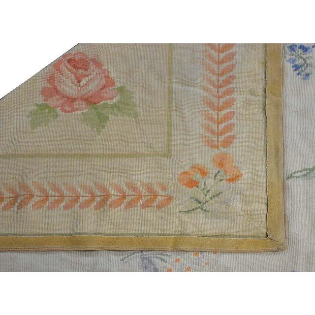 A sweet monumental-scale vintage Chinese Aubusson-style rug with an-all petite floral pattern containing myriad floral...