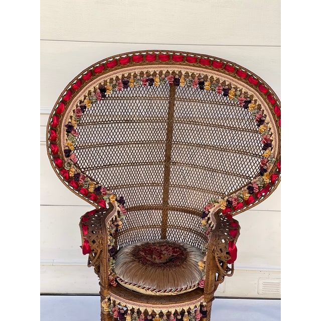 Spectacular 19 to th rattan peacock armchair with round velvet pillow, red atlas ribbon and tassels trim. in Mac Kenzie...