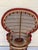 Spectacular 19 to th rattan peacock armchair with round velvet pillow, red atlas ribbon and tassels trim. in Mac Kenzie...