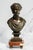 A refined expression of nineteenth-century French bronze artistry, this elegant patinated bronze bust depicts Venus, the...