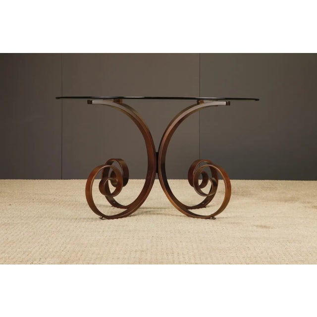 A sculptural and highly collectible example of the 'Sultana' dining table designed by George Mulhauser and produced by...