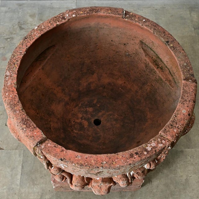 A large English terracotta pot made by Compton Potters of Guildford in the early 20th century. The oversized vessel...