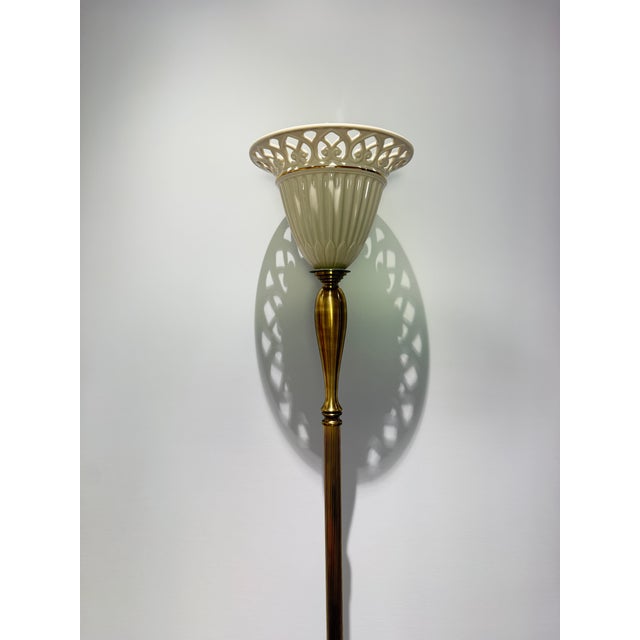 An elegant and highly decorative Lenox for Quoizel torchiere floor lamp, masterfully blending classic American porcelain...