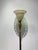 An elegant and highly decorative Lenox for Quoizel torchiere floor lamp, masterfully blending classic American porcelain...