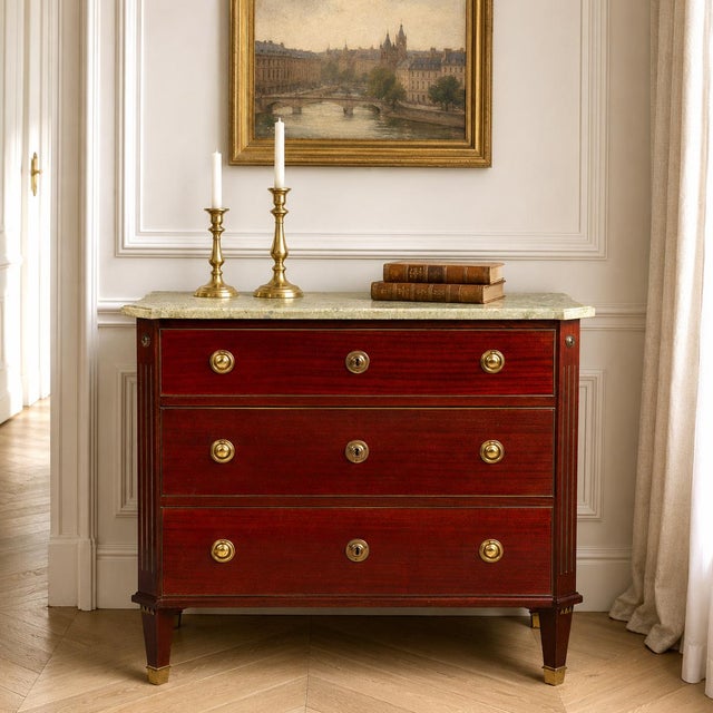 SWEDISH GUSTAVIAN STYLE MAHOGANY THREE DRAWER COMMODE Probably Sweden, 20th century Mahogany veneers over pine, marble...