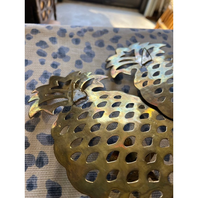 Up for consideration is a beautiful vintage pair of southern brass pineapple candle sconces. These would look lovely in...