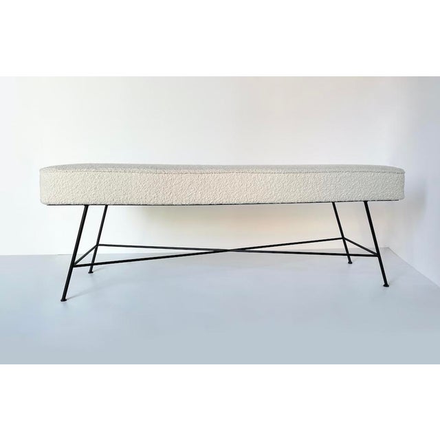 Unique 1990s bench with a black-painted iron frame and a soft cream-white bouclé seat covering. Dimensions: L 135 x D 42 x...