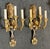 Design Plus Gallery presents a Pair of Brass Torch Wall Sconces in the French Neoclassical Style. French Neoclassical...